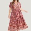 Bandana Surplice Neck Pocket Belted Flutter Hem Maxi Dress
