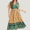 Bandana Surplice Neck Pocket Belted Flutter Hem Maxi Dress